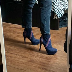 Zip-up, Navy heeled booties.